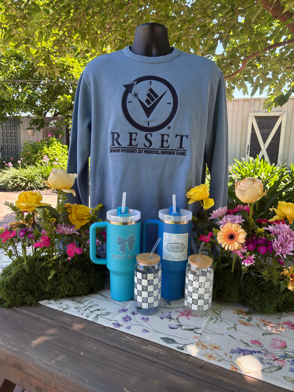 Blue Denim washed Sweatshirt with the RESET compass logo