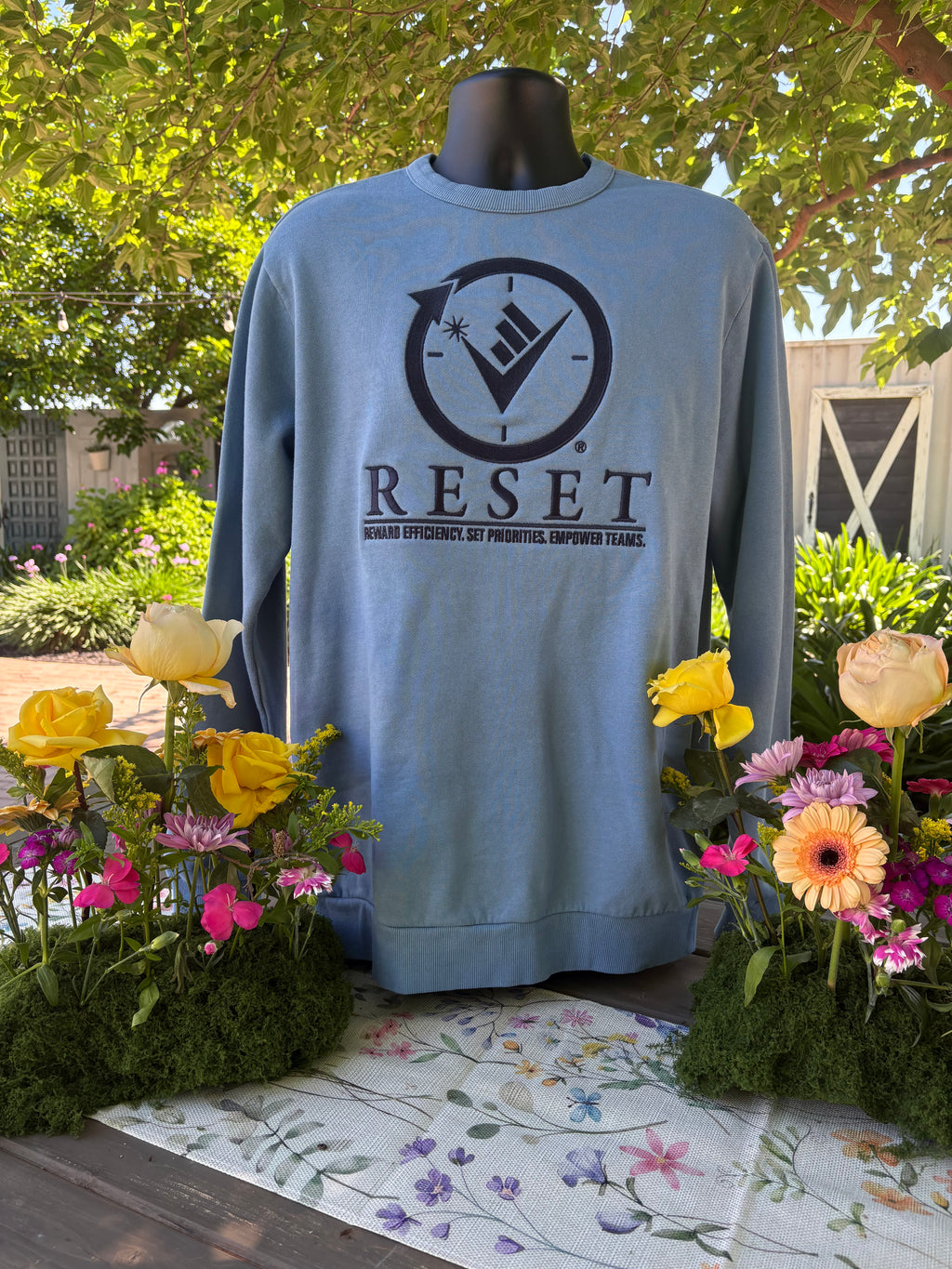 Blue Denim washed Sweatshirt with the RESET compass logo