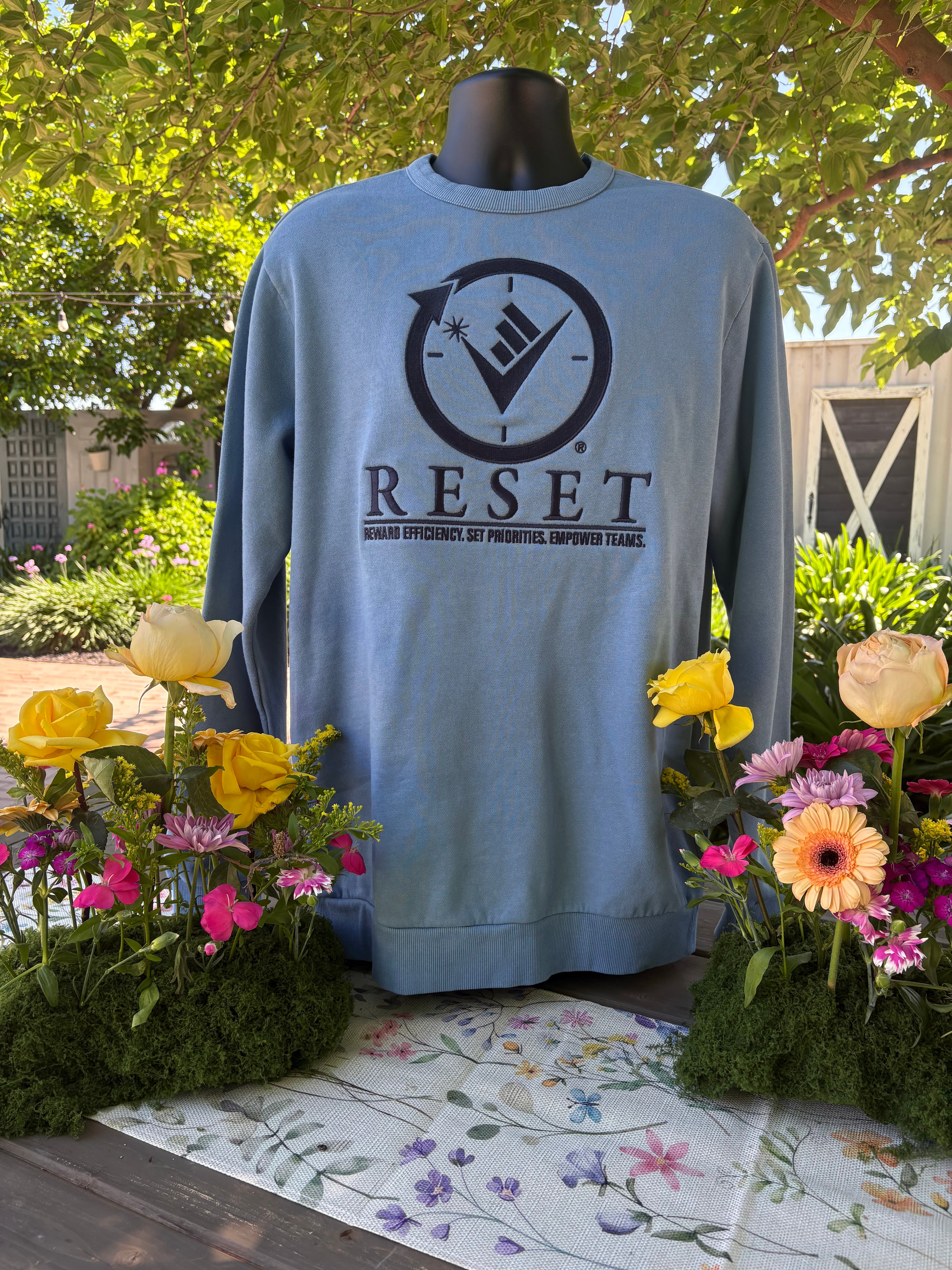 Blue Denim washed Sweatshirt with the RESET compass logo